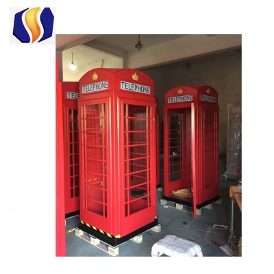 Orange steel telephone booth K6 British telephone box